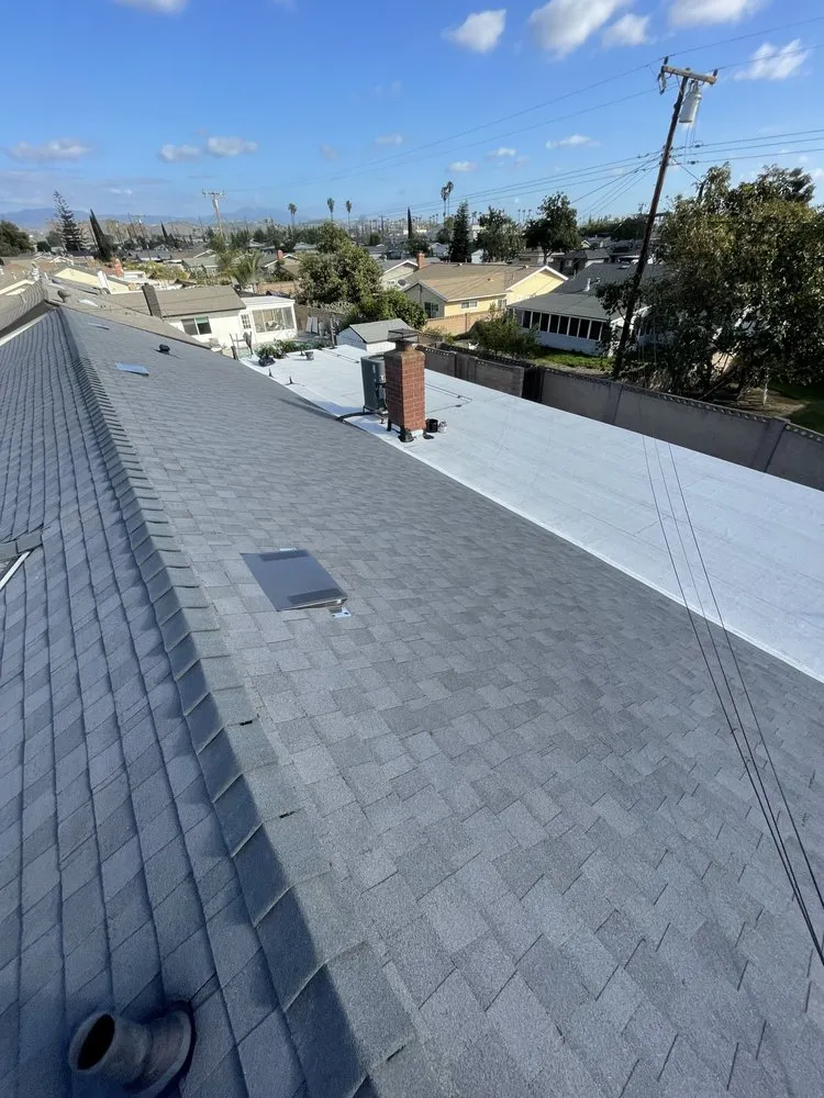 Slide of Baiza's Roofing