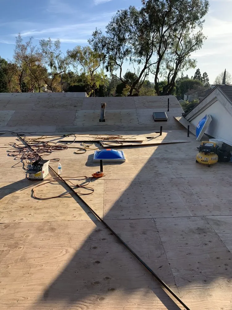 Slide of Baiza's Roofing