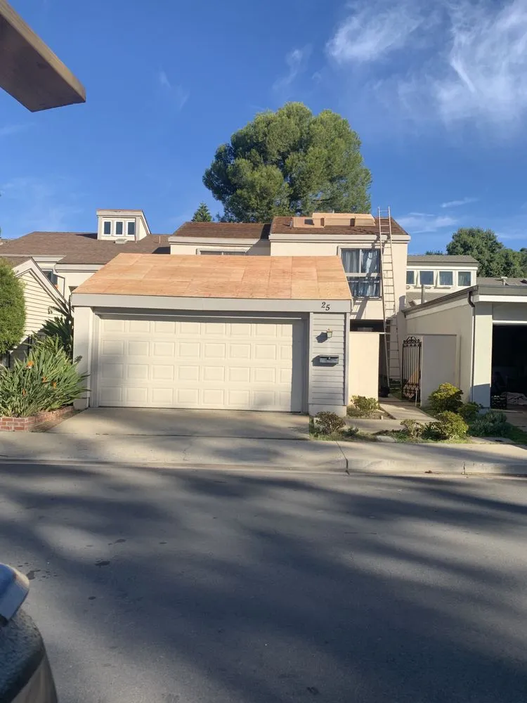 Slide of Baiza's Roofing