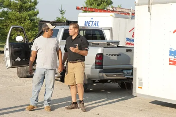 Professional roof repair after storm damage in Runnells, IA by Bakeris Roofing