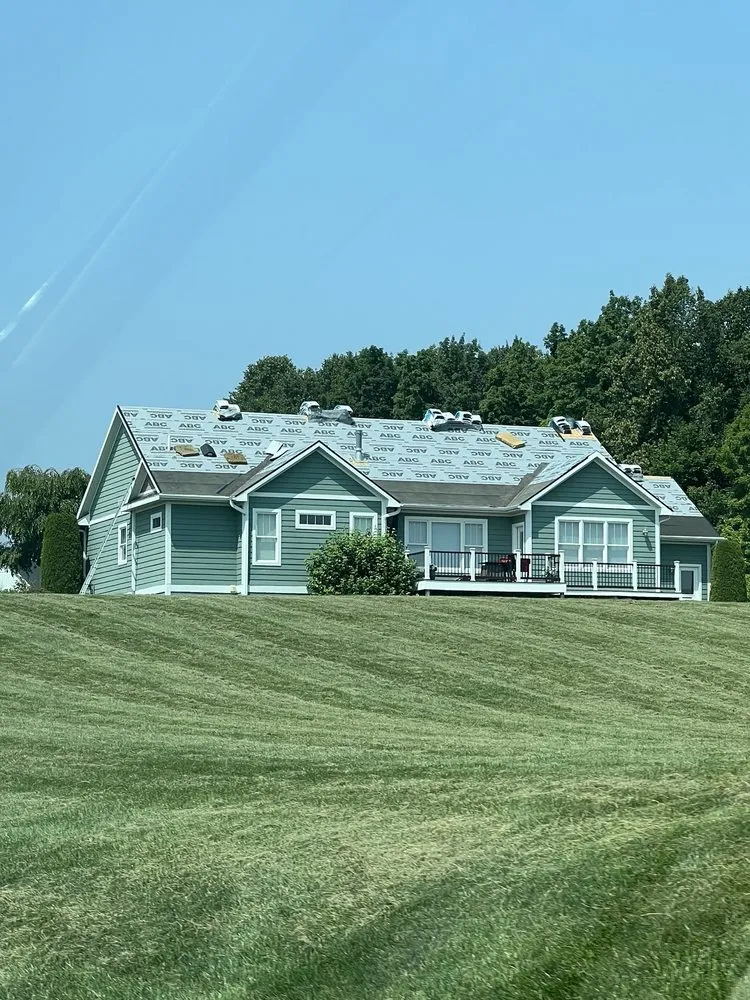 Slide of Bald Eagle Roofing and Exteriors