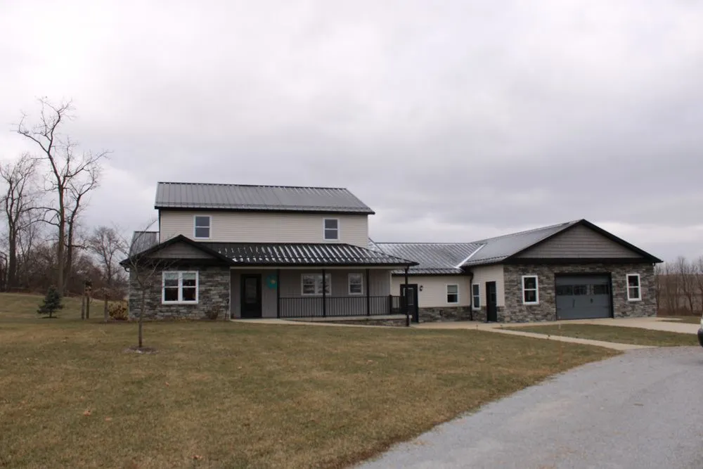 Licensed metal roofing installation with free inspection across Baltic, OH - Baltic Builders