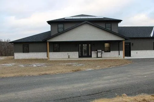 Professional storm damage roof repair in Baltic, OH by Baltic Builders