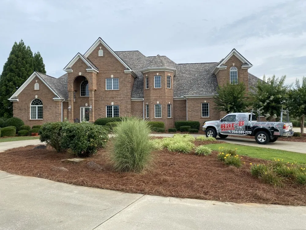 Slide of Bar B Windows & Roofing