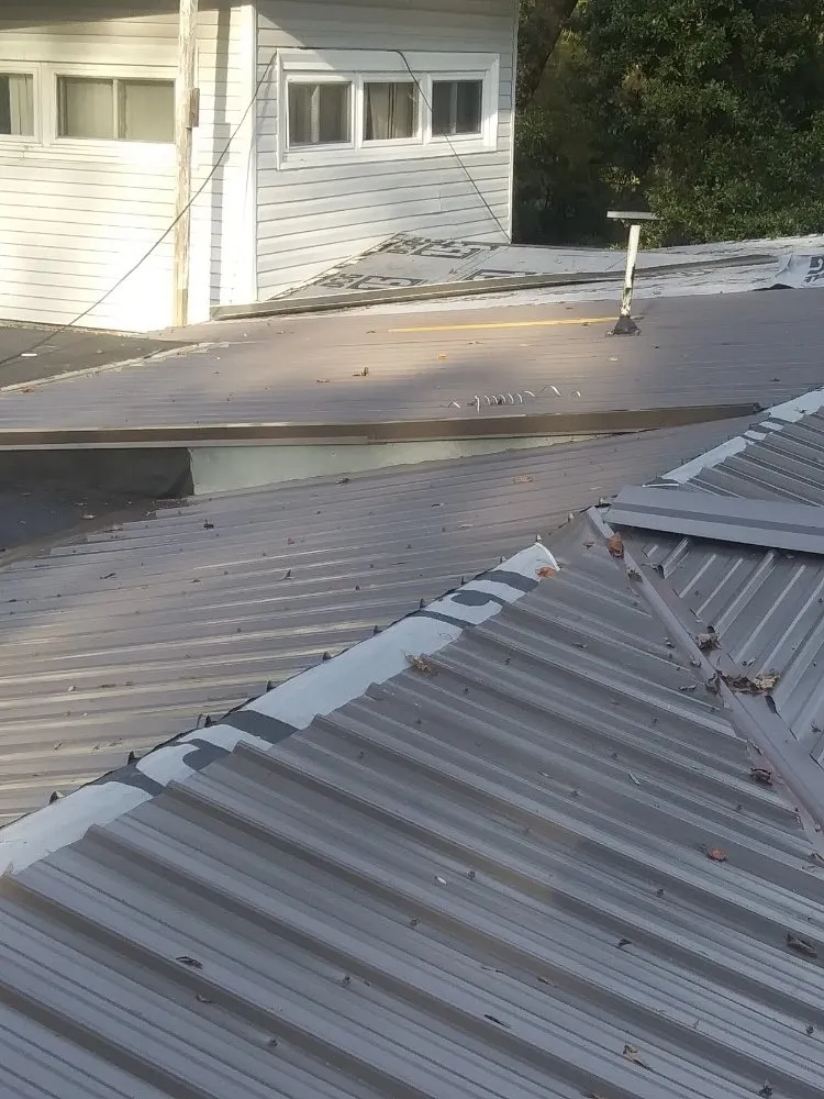 Slide of Barber's Roofing and Home Services