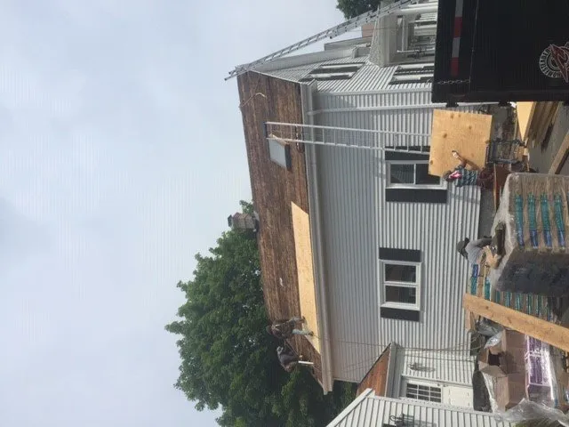 Slide of Bardi's Construction Up On The Roof