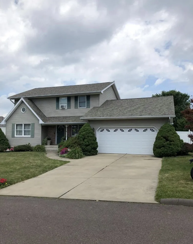 Professional residential roofing service in Elmhurst Township, PA by Barletta Home Improvement