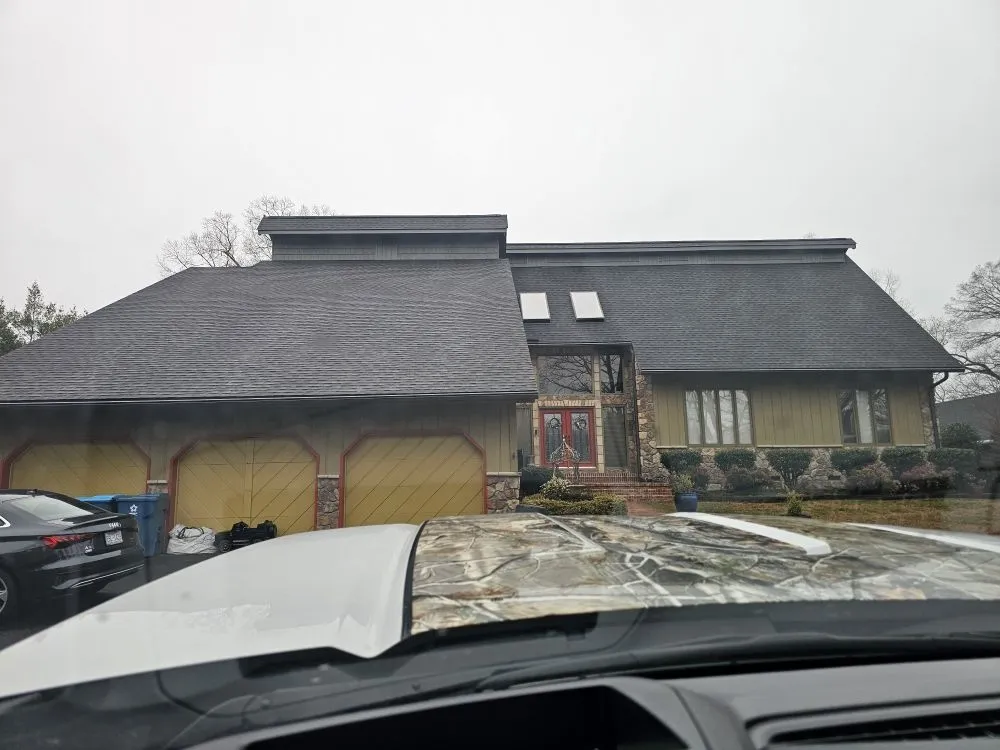 Slide of Barringer Roofing