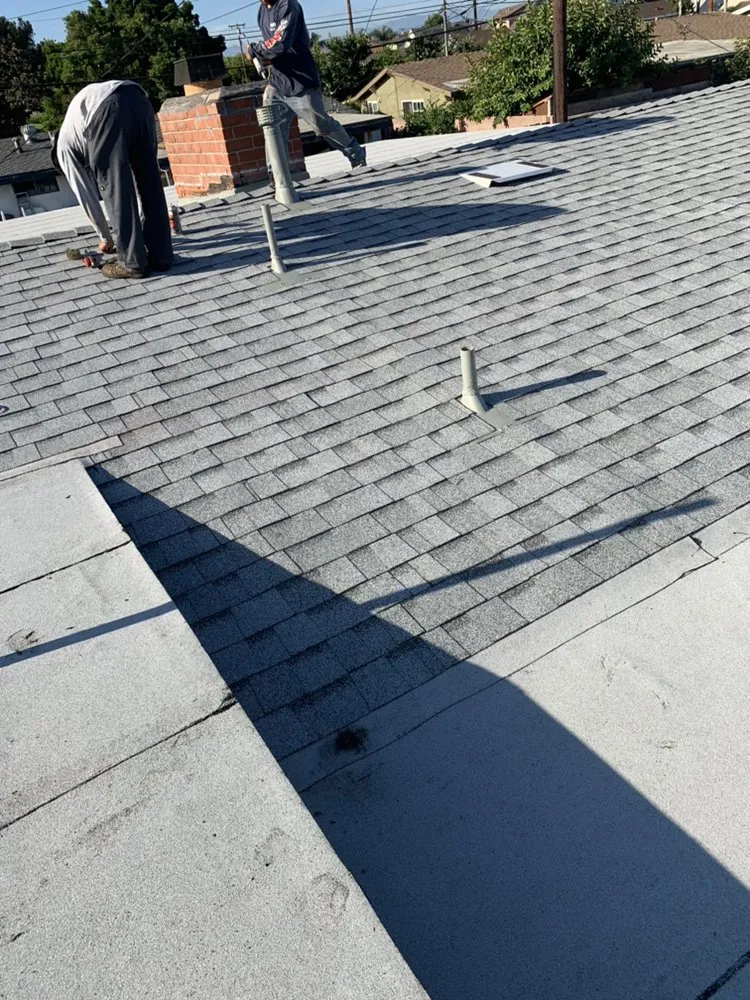 Slide of Barron Roofing