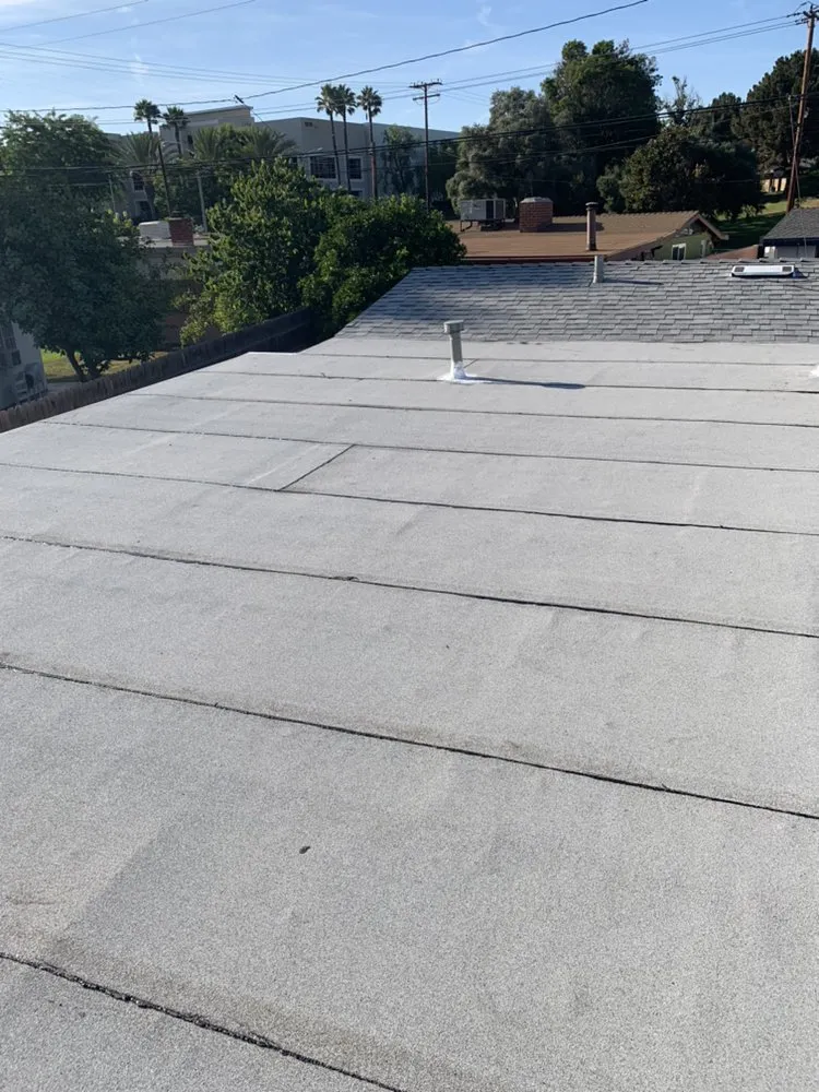 Slide of Barron Roofing