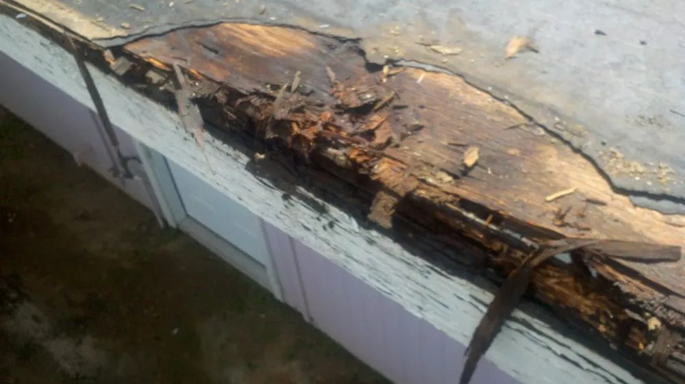 Slide of Barros Roofing