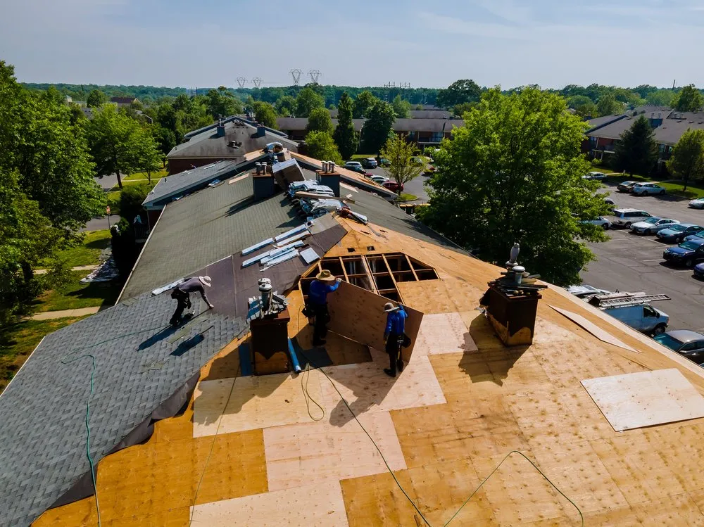 Expert flat roof repair after storm damage in Whitestone, NY by Baschnagel Bros