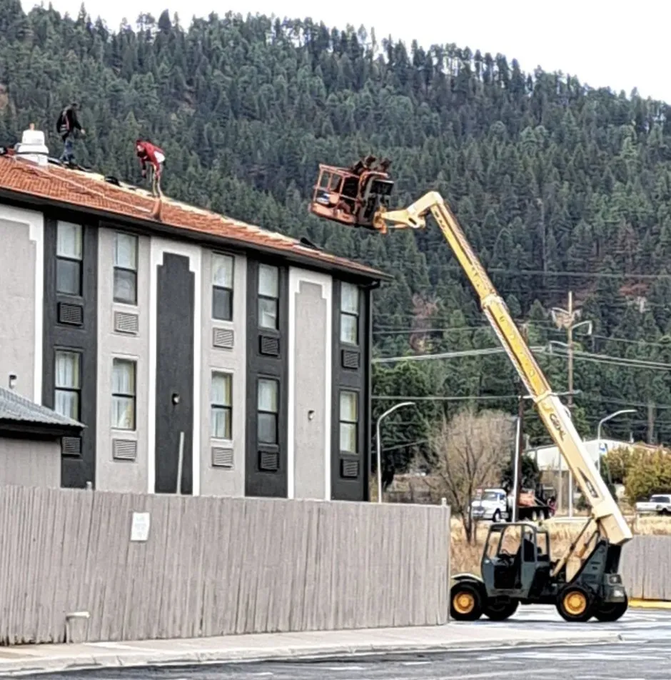 Slide of Bass Brothers Roofing