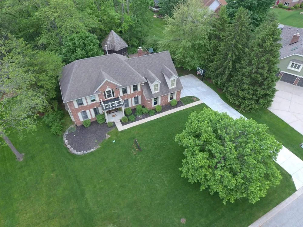 Trusted storm damage roof repair in Oaklandon, IN by Bauerle Roofing