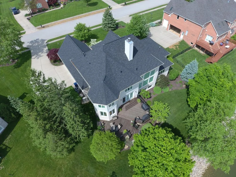 Reliable residential roofing service after storm damage in Oaklandon, IN by Bauerle Roofing