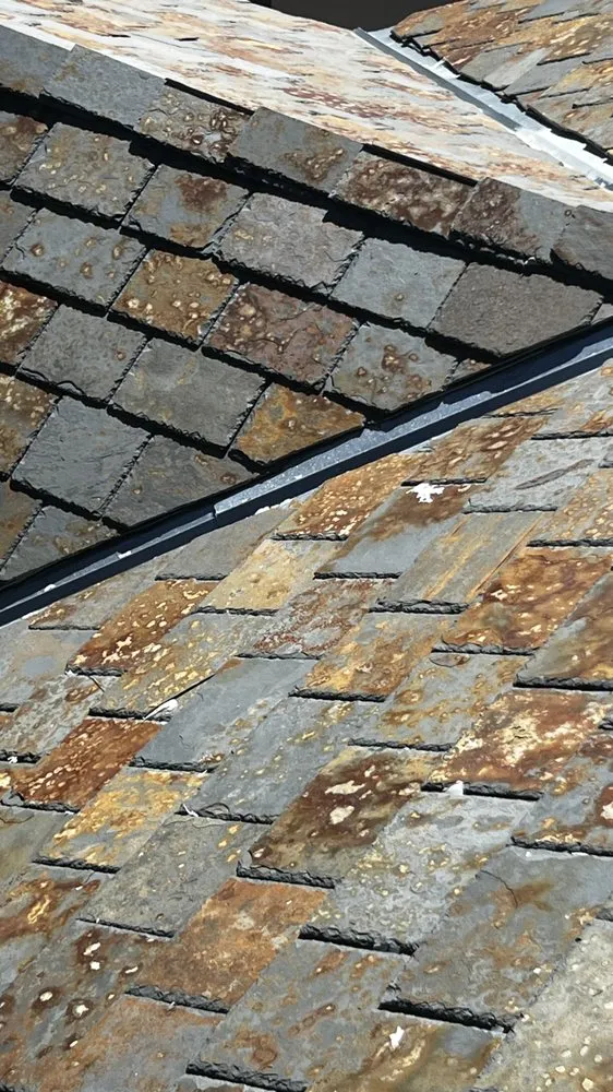 Slide of Bautista Roofing