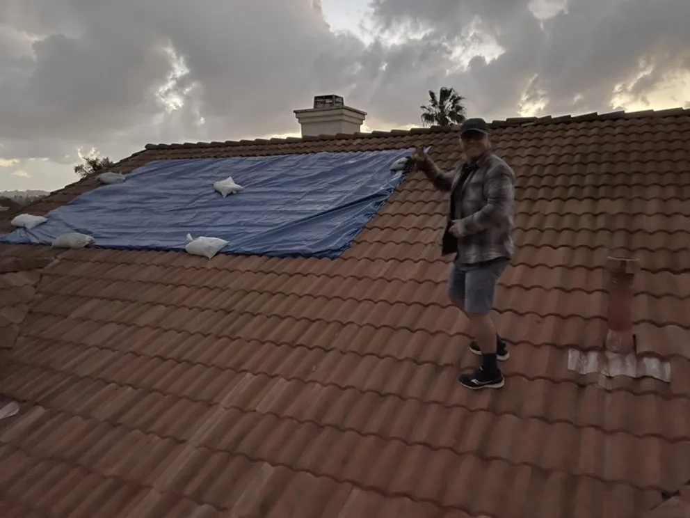 Slide of Baynes Roofing