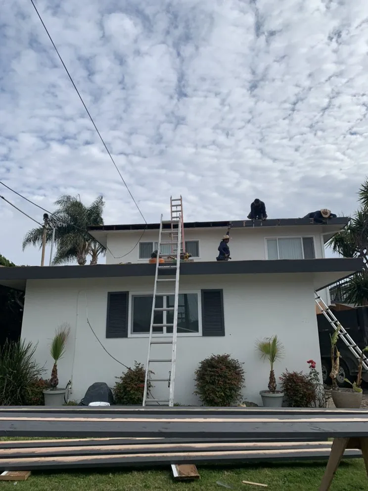 Slide of Baynes Roofing