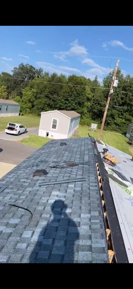 Slide of Bayou Bubba’s Roofing and Repair