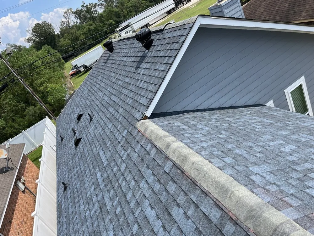 Slide of Bayou Bubba’s Roofing and Repair