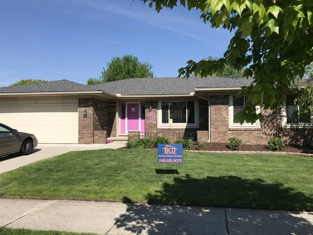 Licensed storm damage roof repair for fast service in St. Clair Shores, MI by BCD Roofing