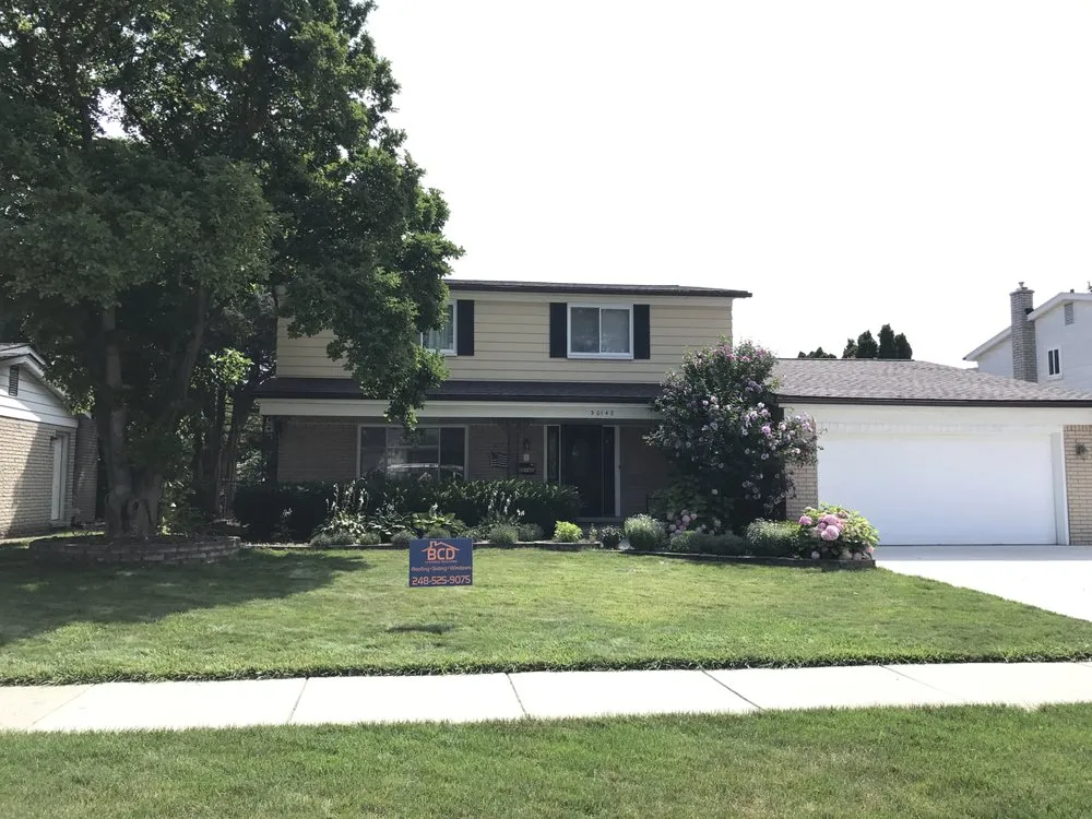 Emergency shingle roofing service for homes in St. Clair Shores, MI by BCD Roofing