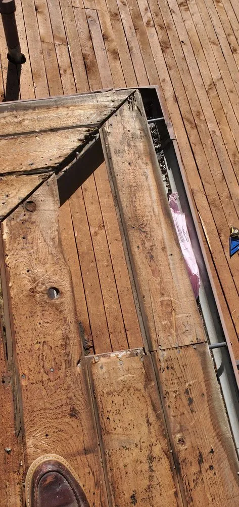 Slide of BD&E Roofing Services