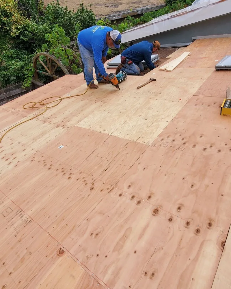 Slide of BD&E Roofing Services