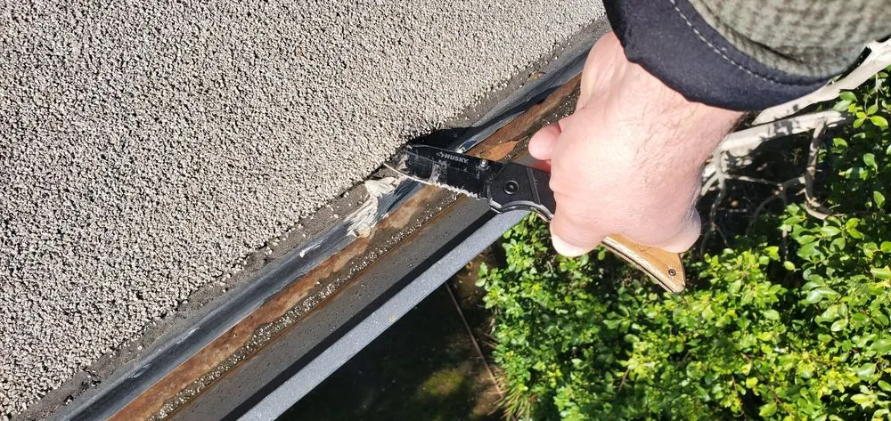 Slide of BD&E Roofing Services