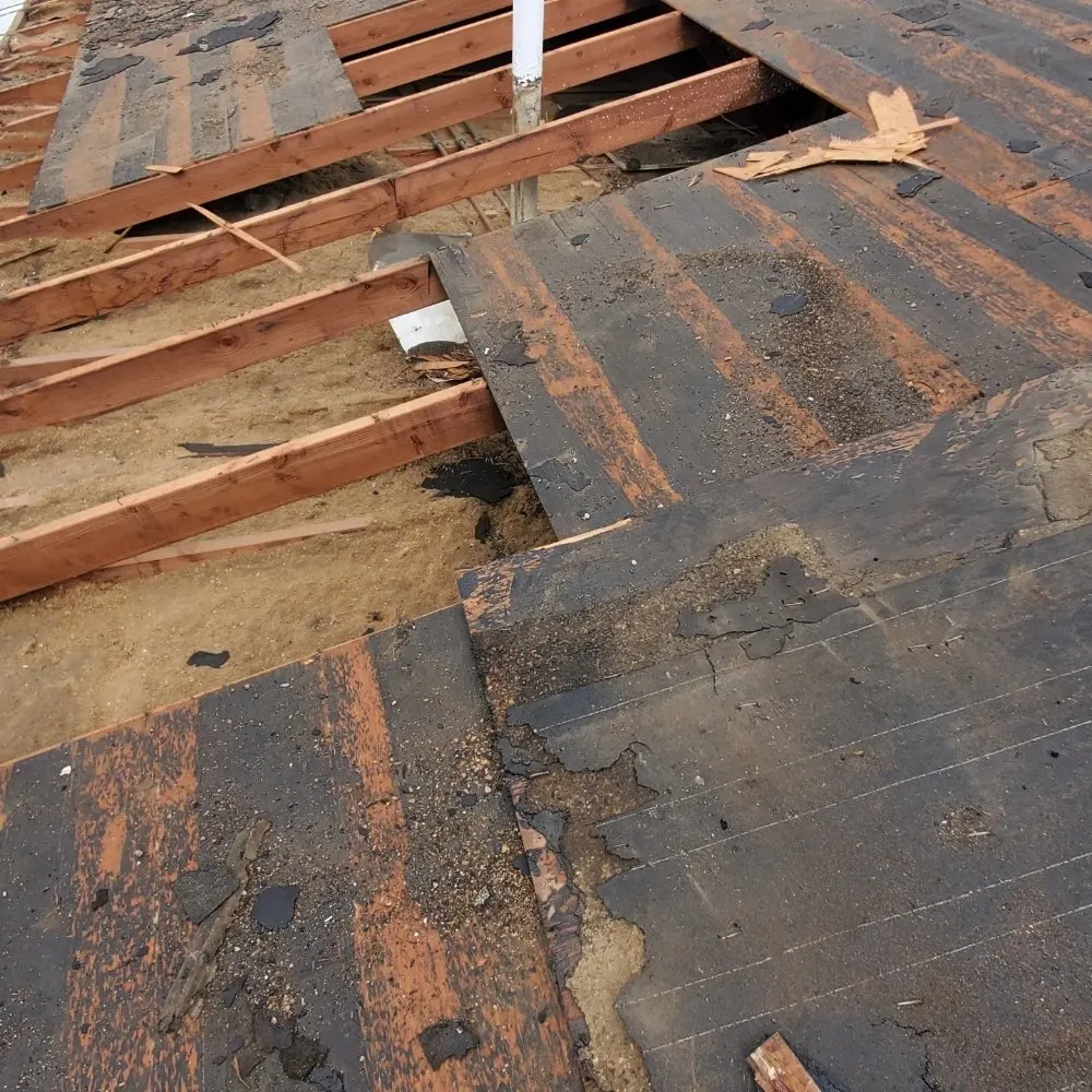 Slide of BD&E Roofing Services