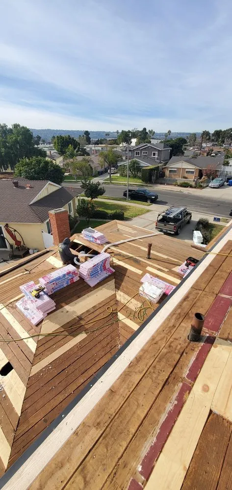 Slide of BD&E Roofing Services