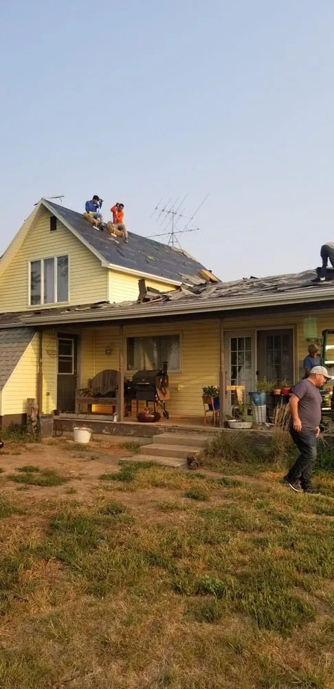 Slide of B&E Roofing