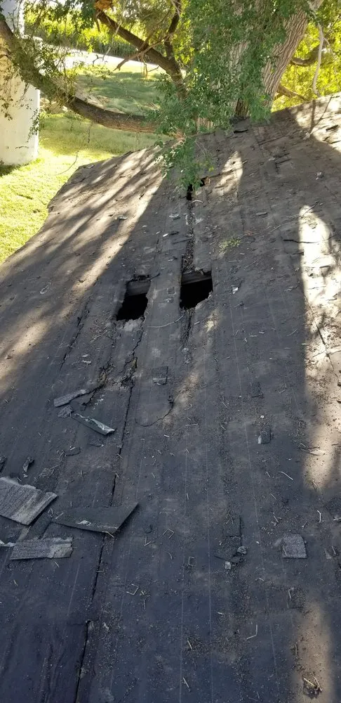 Slide of B&E Roofing