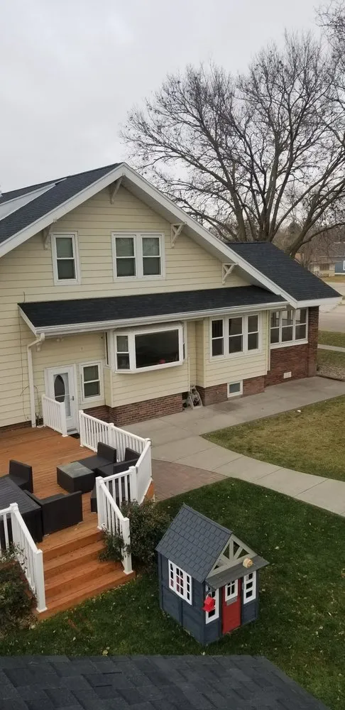 Slide of B&E Roofing