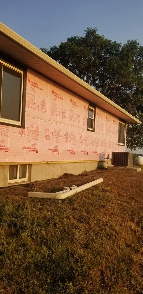 Slide of B&E Roofing