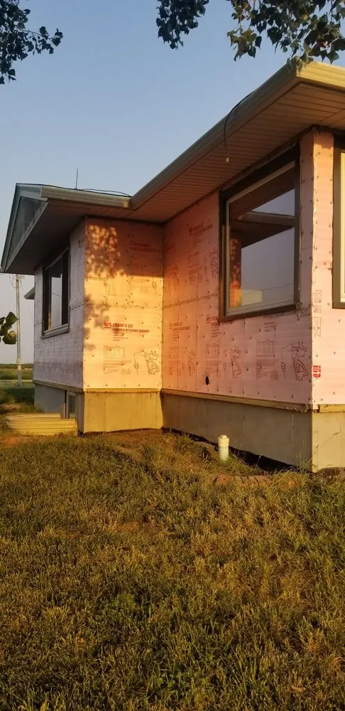 Slide of B&E Roofing