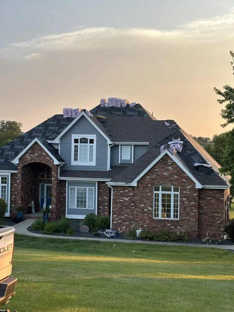 Slide of Bee Roofing and Exteriors