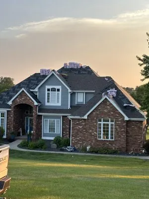 Bee Roofing and Exteriors Logo