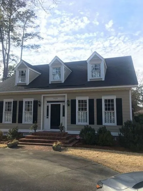 Slide of Bee Roofing