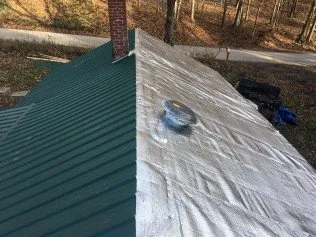 Slide of Beechy's Roofing