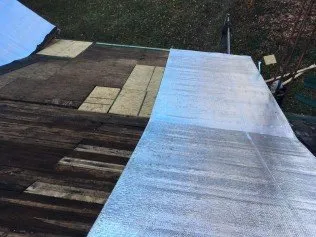 Slide of Beechy's Roofing