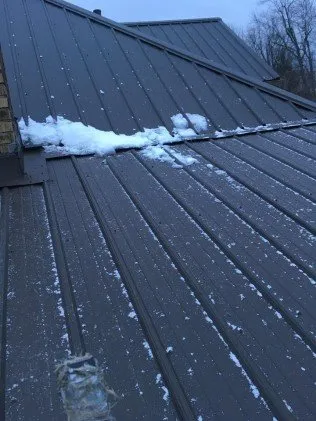 Slide of Beechy's Roofing