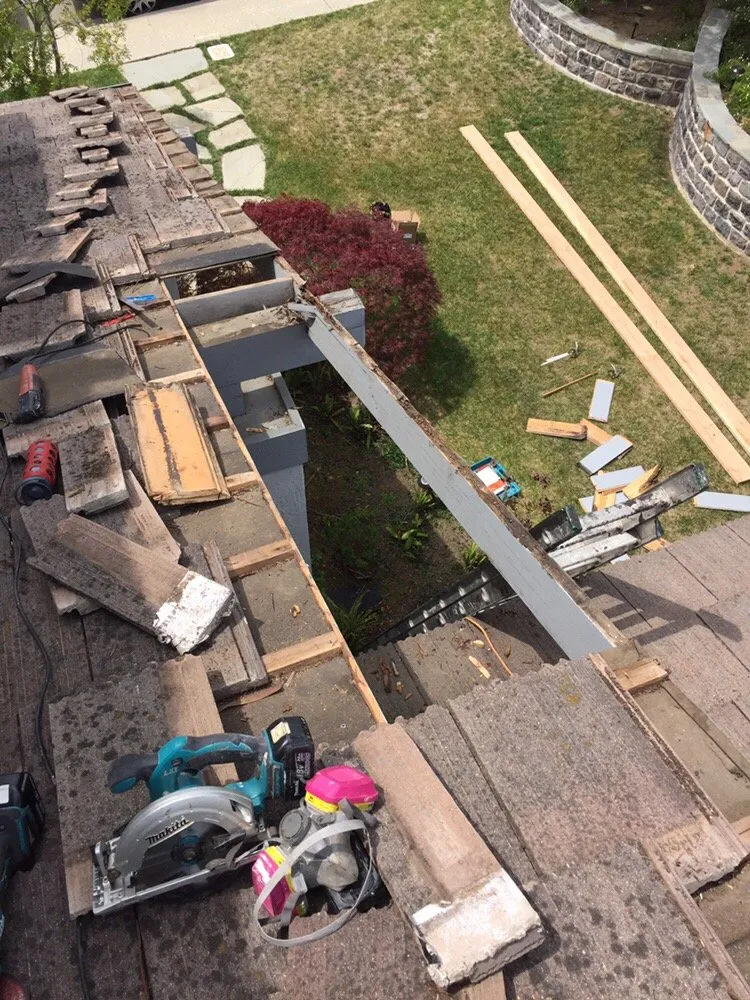 Slide of Beethovens Roofing Works