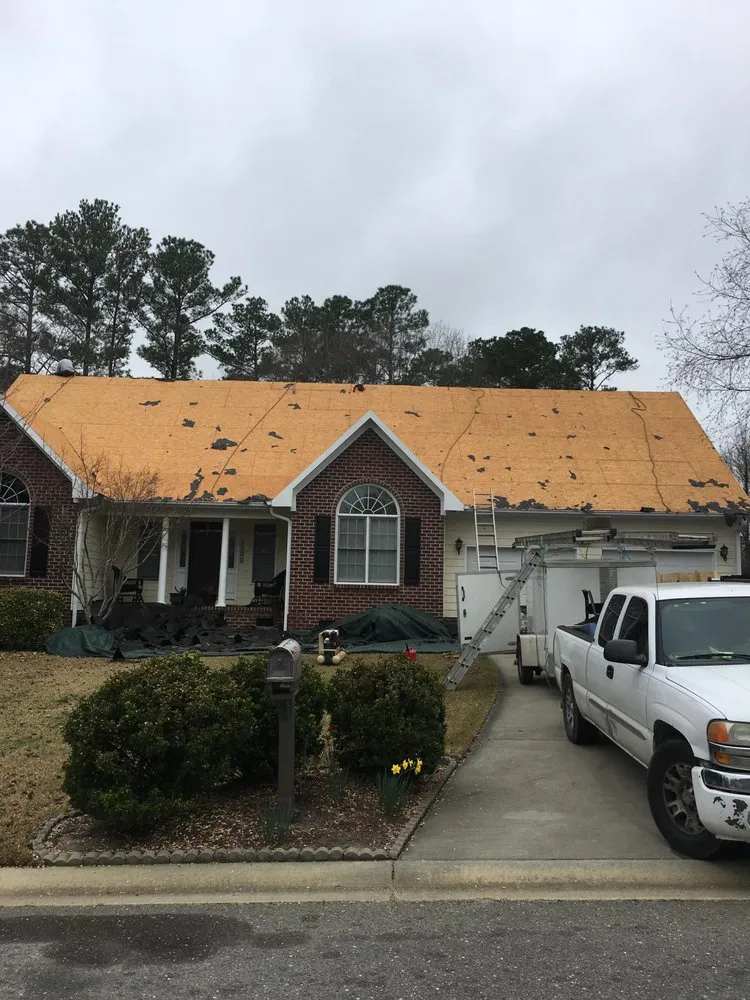 Slide of Behold Roofing