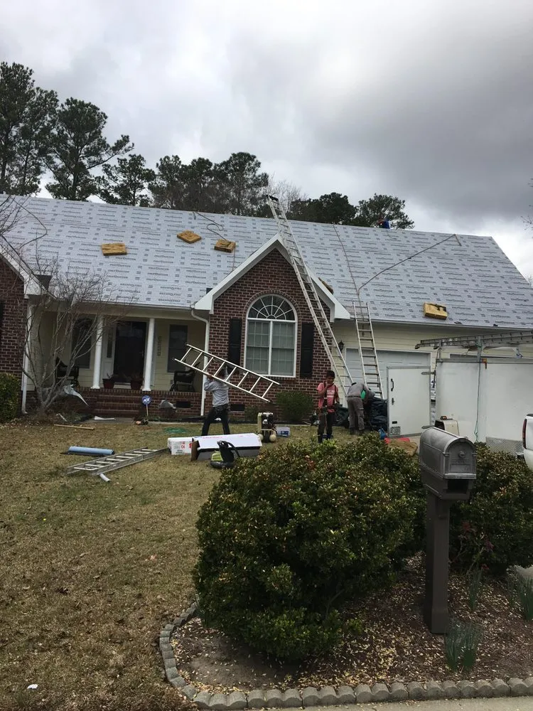 Slide of Behold Roofing