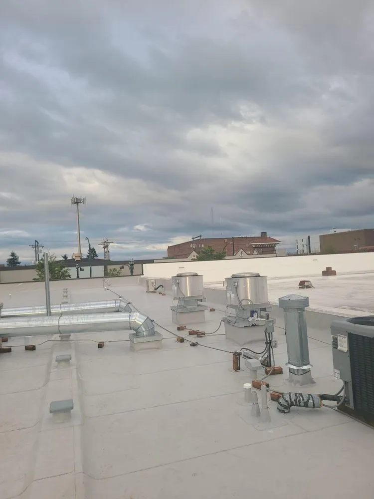 Slide of Bel-Red Roofing