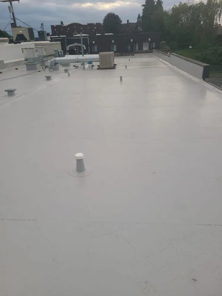 Slide of Bel-Red Roofing