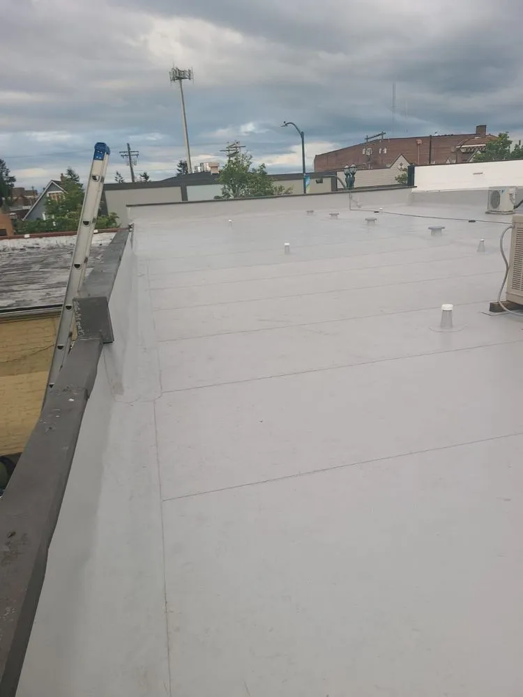 Slide of Bel-Red Roofing