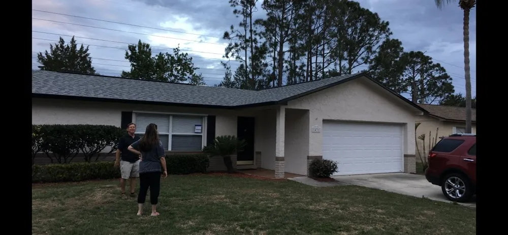 Slide of Belcher Roofing