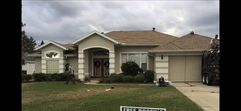 Slide of Belcher Roofing